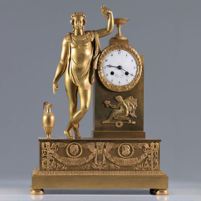Imposing Empire clock in gilded bronze
