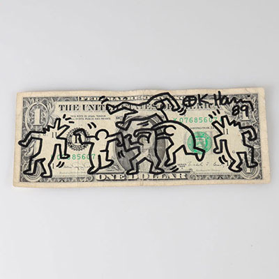 Keith HARING (1958-1990) Dessin au marker noir signé et daté sur un billet de banque d’un dollar datant de 1988.
