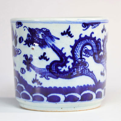 White and blue porcelain brush holder decorated with dragons