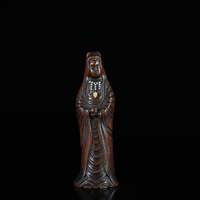 Asia deity in carved wood with inlays 19th