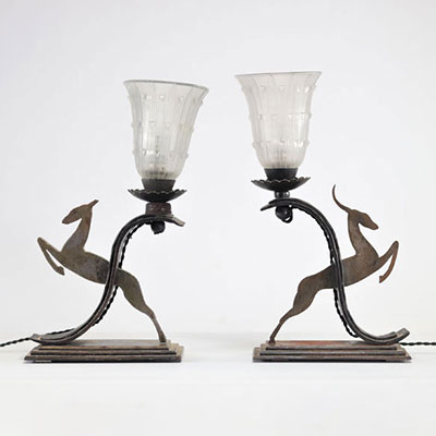 Pair of Art Deco stag lamps, the base signed by Michel Zadounaisky (1903-1983) and the candle rings signed by R. Lalique (1903-1983)