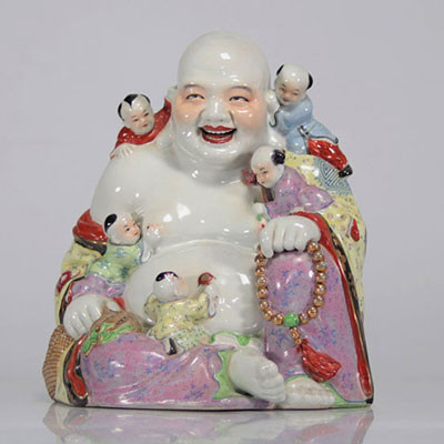 Buddha in famille rose porcelain