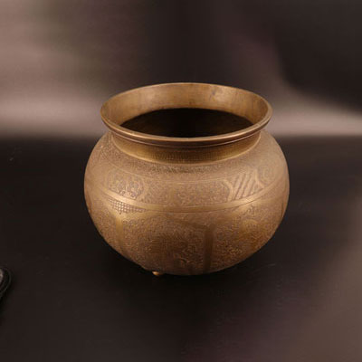 Brass vase with engraved decoration of characters