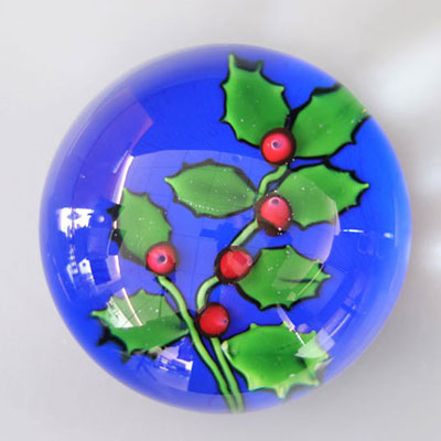 Saint-Louis paperweight, branch of holly on a blue background