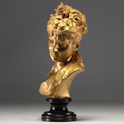 Bust of a young girl in bronze with gilded patina, published by the 
