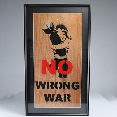 Banksy, (attr). “No Wrong War”. Circa 2003. Black and red paint stencil on wood panel. Bears the label on the back of the NGO 