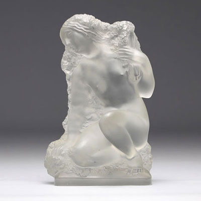 LALIQUE glass depicting a nude young woman picking flowers