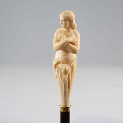 Walking cane with an undressed girl carved in ivory. Certificate.