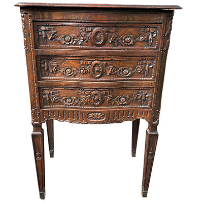 Small richly carved chest of drawers from Liege (Belgium)