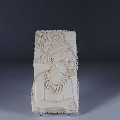 Ivory plaque carved with a character probably Mangbetu 