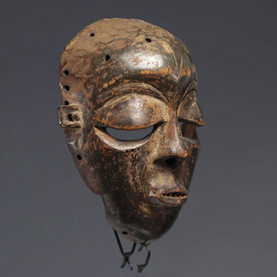 PENDE, ground floor, wooden mask with brown patina