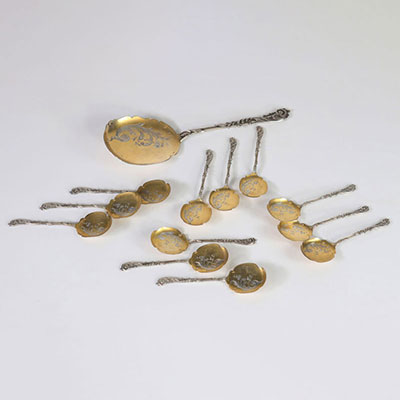 12 silver spoons and ice cream scoop, late 19th century, silver and vermeil Punch neck brace and punch of Henri Soufflot (1884-1910). Its punch is in rhombus with HS and rising sun. Rare set of