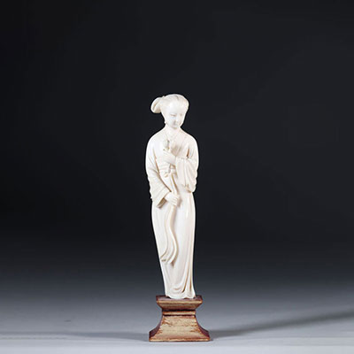 China sculpture of a young woman carrying flowers circa 1900