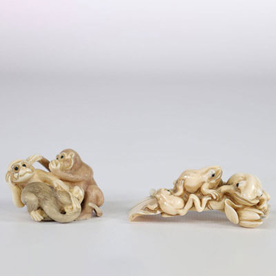 Two ivory netsuke, monkeys and frogs