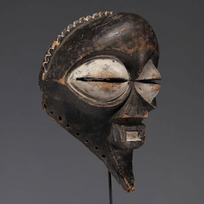 Mask, Congo, wood with dark patina and white pigment