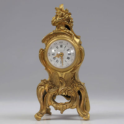 Louis XV clock in gilded bronze