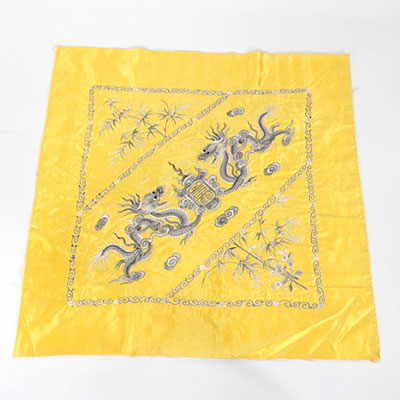 China embroidered silk decorated with imperial dragon on a yellow background Qing dynasty