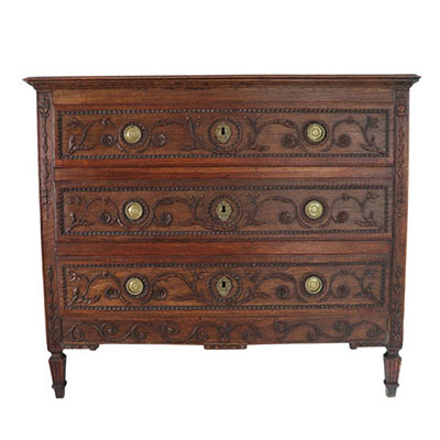 18th century chest of drawers carved with plant motifs