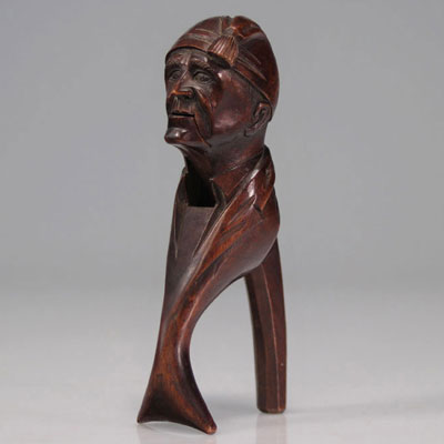 Casse-noix en bois sculpté à tête d'homme