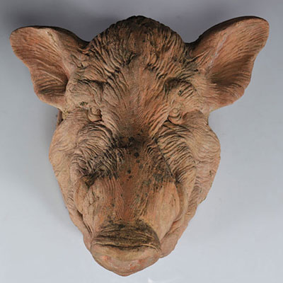 Boar's head in terracotta hunting decoration