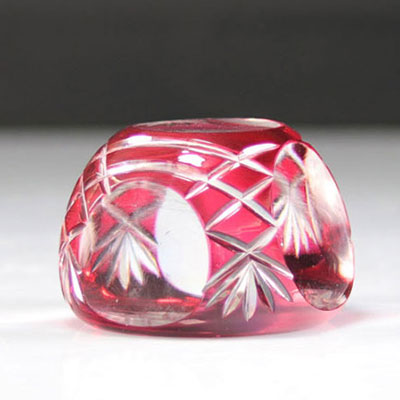 Val Saint-Lambert cut paperweight with red background