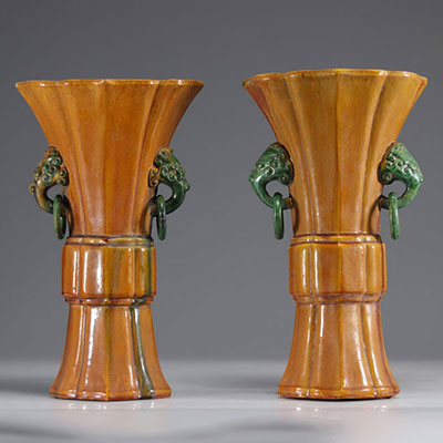 Pair of Gu-shaped Sancai porcelain and enamel vases
