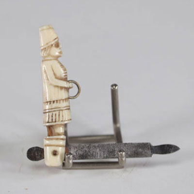 Miniature file carved with a 19th century character