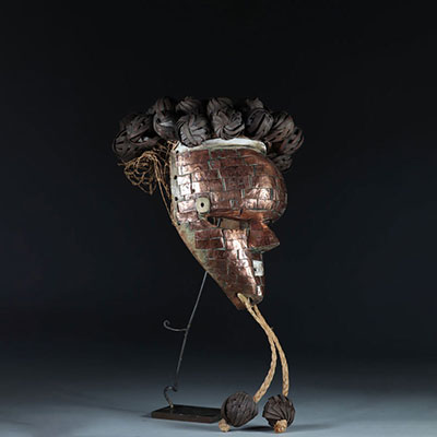Salampasu mask in wood covered with copper
