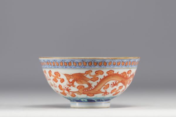China - Porcelain bowl decorated with dragons with five claws, blue mark under the piece.