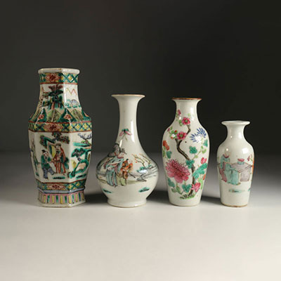 Lot of four famille rose vases. Nineteenth China.