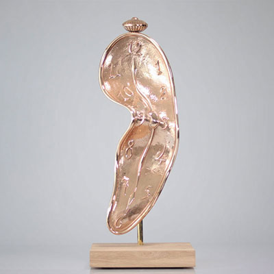 Salvador Dali. “Time in the Fourth Dimension”. Soft watch in gilded bronze mounted on a wooden base. Signed on the front 
