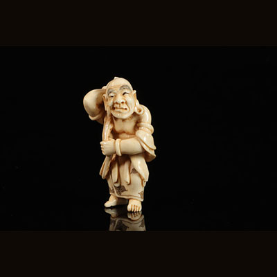 Netsuké (ivory) carved with a character from the Meiji period