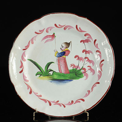 Les Islettes France Plate with standing Chinese holding a banner in hand. 18th -.