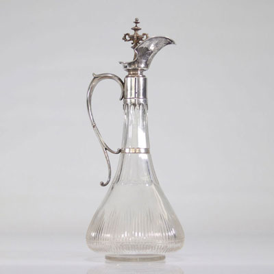Crystal carafe. Silver lid surmounted by a crown. XIX th centuries