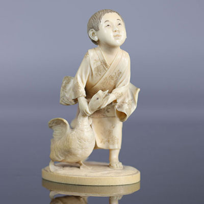 Japon Okimono sculpté d'un jeune garçon avec une oie 19ème