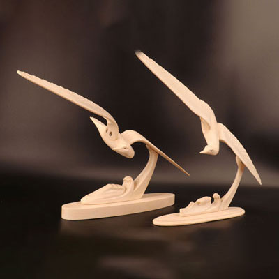 Pair of Art Deco sculptures in ivory seagulls above the waves