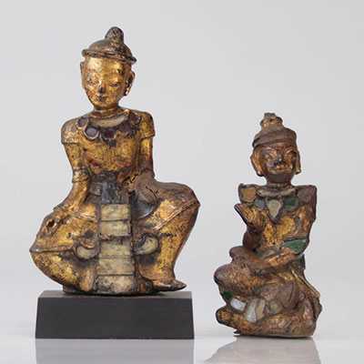 Divinities in carved gilded wood with glass inlays