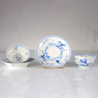 China pair of blanc bleu porcelain bowls decorated with riders