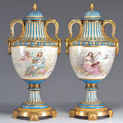 Sèvres imposing pair of vases decorated with romantic scenes and cupids in gilded bronze