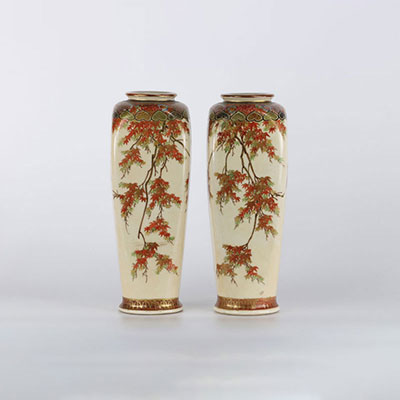 Pair of Japanese Meiji period porcelain vases with tree decoration