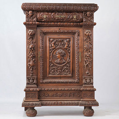 Furniture table and chairs carved with heads of lions and angels