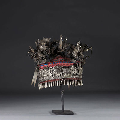 China hat decorated with silver decoration of flowers circa 1900