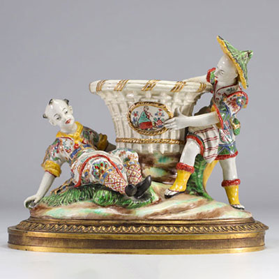 Saint-Cloud porcelain with Mandarin decoration mounted on bronze