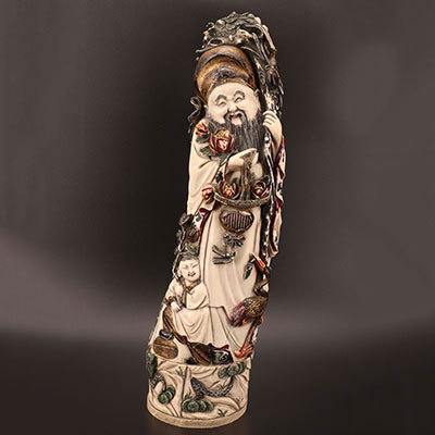 Chine - Grand ivoire sculpté et polychrome représentant un sage et enfant 19ème