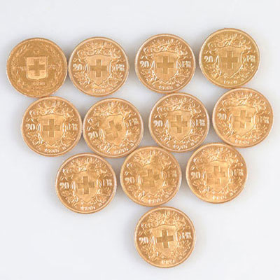 Lot de 12 pièces en or de 20 frs Suisse