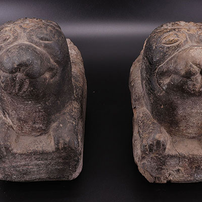 France - pair of stone andirons - heads of dogs - XIIIth