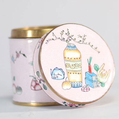 China enamel box decorated with furniture on a pink background