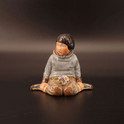 Royal Copenhagen young Inuit with bouquet of flowers