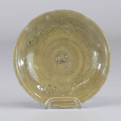 China dish in glazed earthenware with floral pattern and in the center a turtle Ming period or earlier.