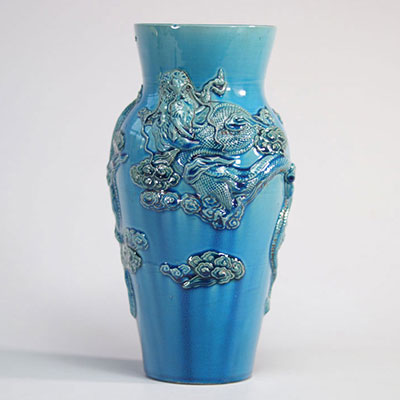 Blue glazed stoneware vase decorated with dragons